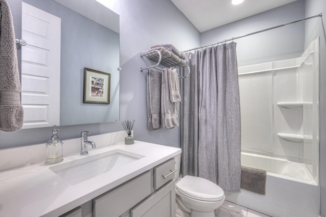 full bath with vanity, shower / bath combo with shower curtain, and toilet