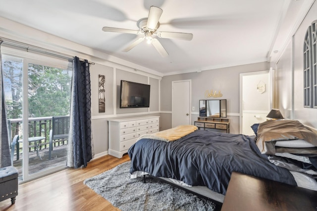 bedroom with access to outside, a ceiling fan, and light wood finished floors