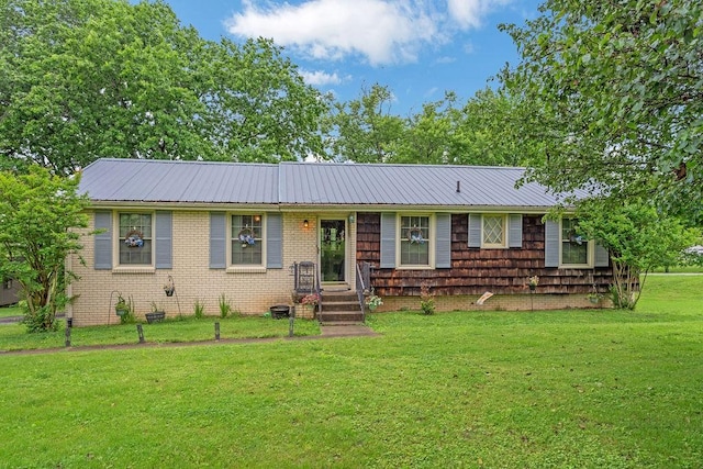 418 Mason Ln, Goodlettsville, TN 37072 - single story home featuring a front lawn, metal roof, and brick siding