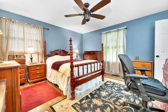 418 Mason Ln, Goodlettsville, TN 37072 - bedroom featuring multiple windows, wood finished floors, a ceiling fan, and a desk