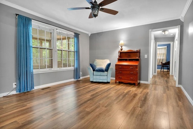 418 Mason Ln, Goodlettsville, TN 37072 - living area with wood finished floors, a ceiling fan, ornamental molding, and baseboards
