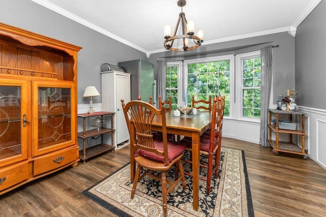 418 Mason Ln, Goodlettsville, TN 37072 - dining space with a chandelier, crown molding, and wood finished floors