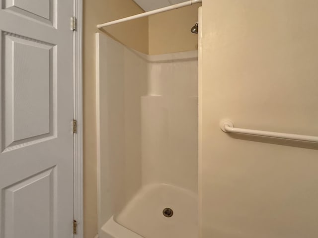 full bathroom with a shower stall