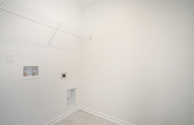 257 Brook Ave, White House, TN 37188 - laundry area featuring electric dryer hookup, baseboards, laundry area, and hookup for a washing machine