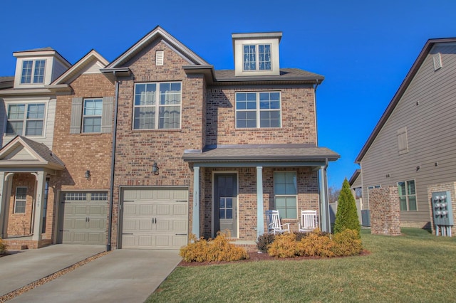 view of front of house featuring an attached garage, a front lawn, brick siding, a porch, and concrete driveway