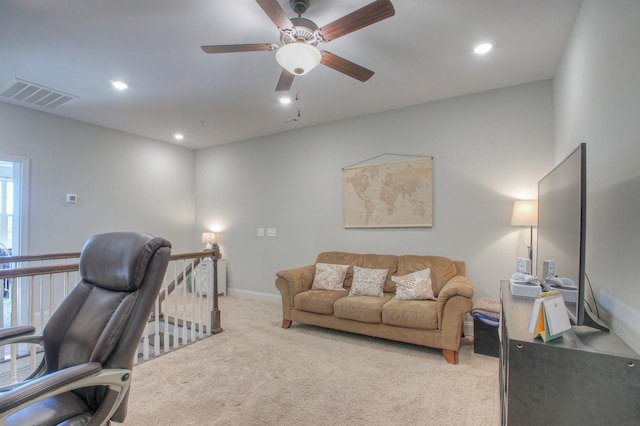 office area featuring visible vents, recessed lighting, ceiling fan, and light carpet