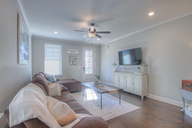living area featuring crown molding, dark wood-style flooring, baseboards, ceiling fan, and recessed lighting