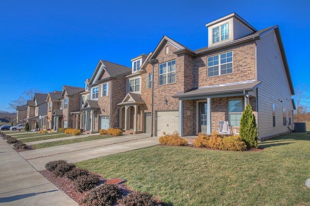 view of front facade with driveway, a residential view, a garage, central air condition unit, and a front lawn