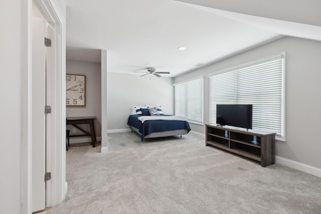 bedroom featuring baseboards, carpet, ceiling fan, and visible vents