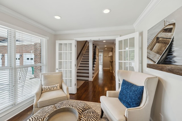sitting room with crown molding, recessed lighting, and wood finished floors