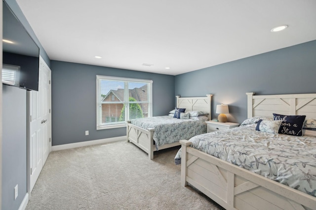 bedroom featuring baseboards, carpet, and recessed lighting