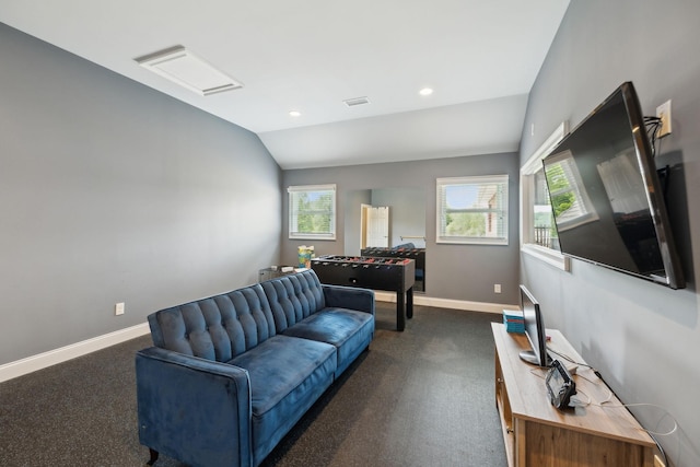 living room with visible vents, lofted ceiling, baseboards, dark carpet, and recessed lighting