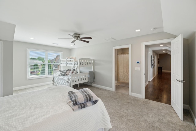 bedroom featuring carpet, a ceiling fan, baseboards, recessed lighting, and visible vents