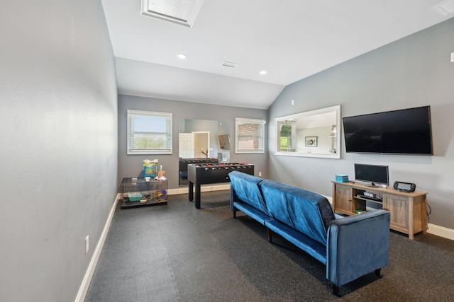 bedroom featuring baseboards, vaulted ceiling, and recessed lighting