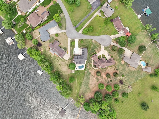 birds eye view of property featuring a water view