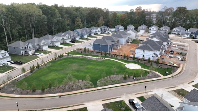 birds eye view of property with a residential view