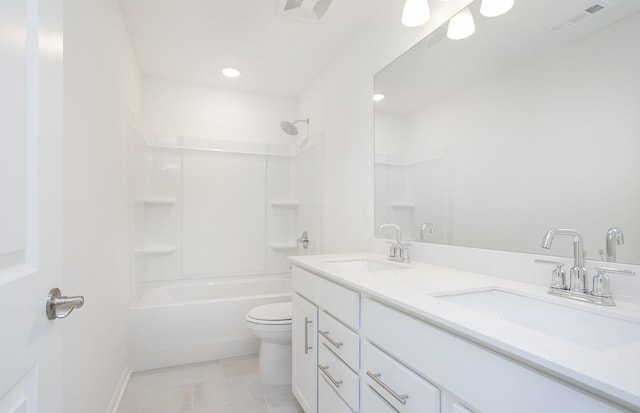 bathroom featuring toilet, visible vents, and a sink