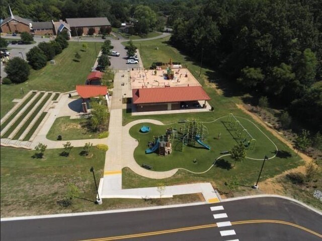 aerial view featuring a view of trees
