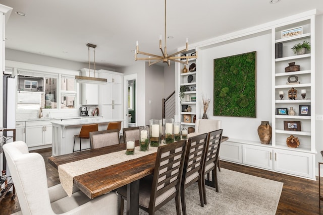 3116 Trevor St, Nashville, TN 37209 - dining room with stairs, a notable chandelier, dark wood-style floors, and built in features