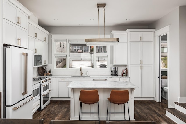 3116 Trevor St, Nashville, TN 37209 - kitchen with a sink, high quality appliances, and white cabinetry