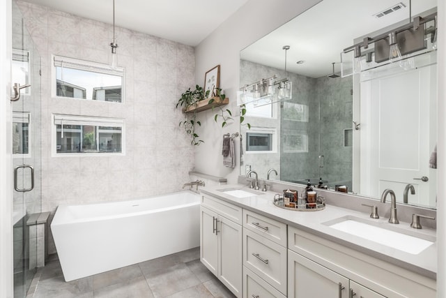 3116 Trevor St, Nashville, TN 37209 - bathroom featuring visible vents, a sink, a freestanding bath, and a stall shower