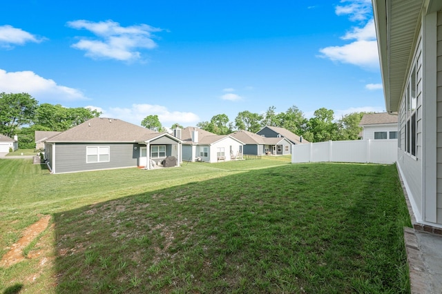 view of yard featuring a residential view