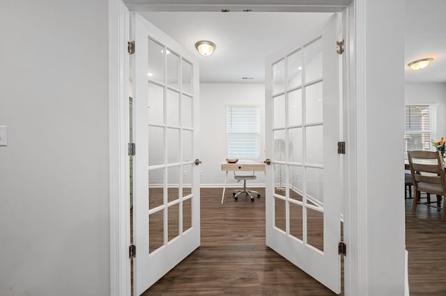 interior space featuring french doors and wood finished floors