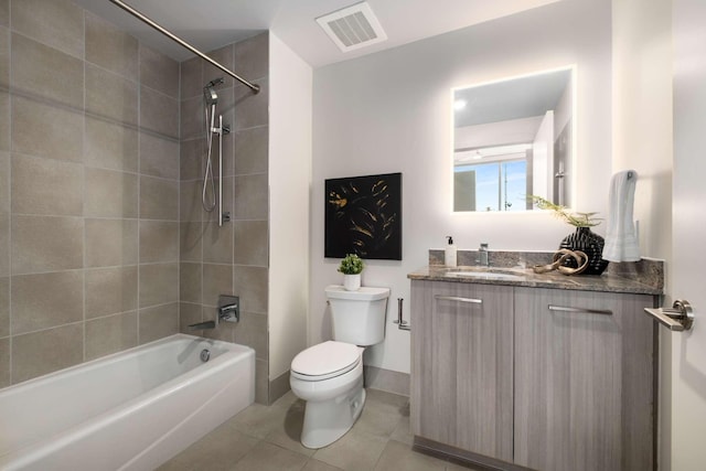 bathroom with shower / tub combination, tile patterned flooring, vanity, toilet, and visible vents