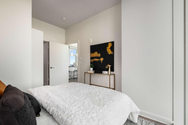 bedroom featuring baseboards