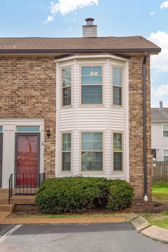 250 Sanders Ferry Rd Unit 4, Hendersonville, TN 37075 - townhome / multi-family property featuring brick siding, uncovered parking, and roof with shingles