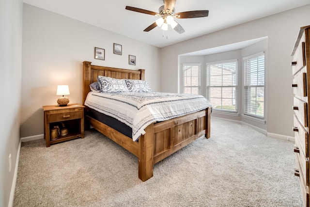 250 Sanders Ferry Rd Unit 4, Hendersonville, TN 37075 - bedroom with baseboards, a ceiling fan, and light carpet