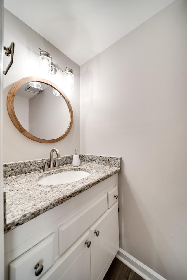 250 Sanders Ferry Rd Unit 4, Hendersonville, TN 37075 - bathroom with baseboards, vanity, and wood finished floors