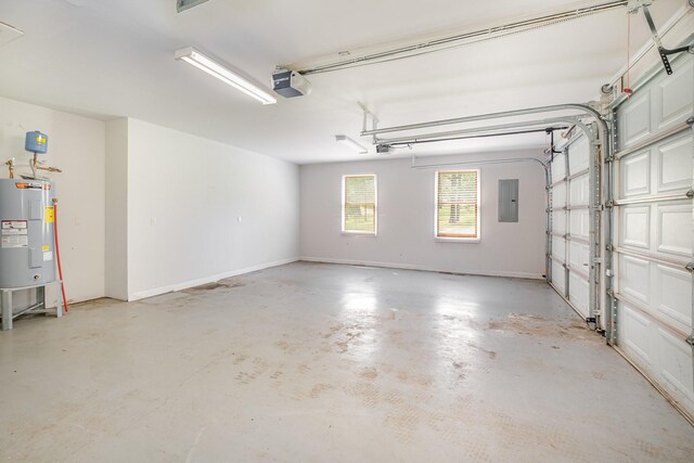 garage with a garage door opener, water heater, and electric panel
