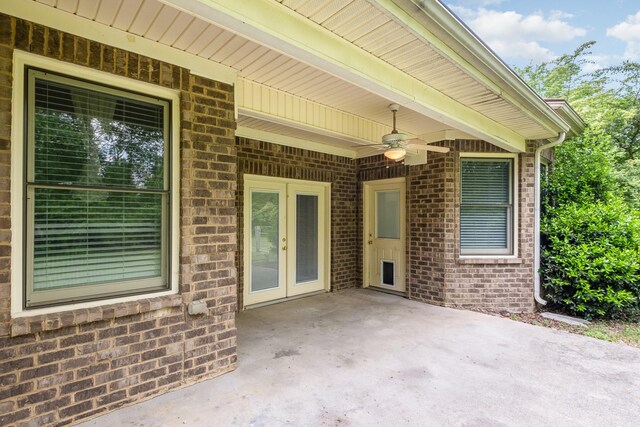 view of patio / terrace with french doors and a ceiling fan