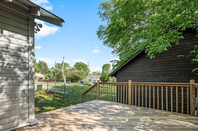 200 Tucker St, Decherd, TN 37324 - wooden deck featuring a yard