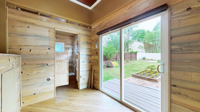 706 N Church St, Murfreesboro, TN 37130 - doorway to outside with wooden walls and light wood-style floors