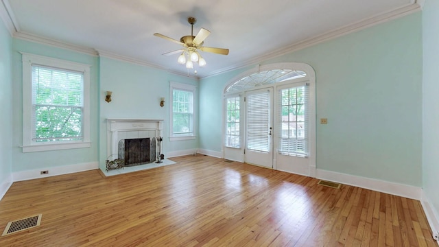 706 N Church St, Murfreesboro, TN 37130 - unfurnished living room featuring light wood-style floors, plenty of natural light, and visible vents