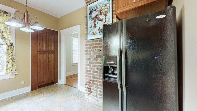 706 N Church St, Murfreesboro, TN 37130 - kitchen with an inviting chandelier, black refrigerator with ice dispenser, baseboards, visible vents, and ornamental molding