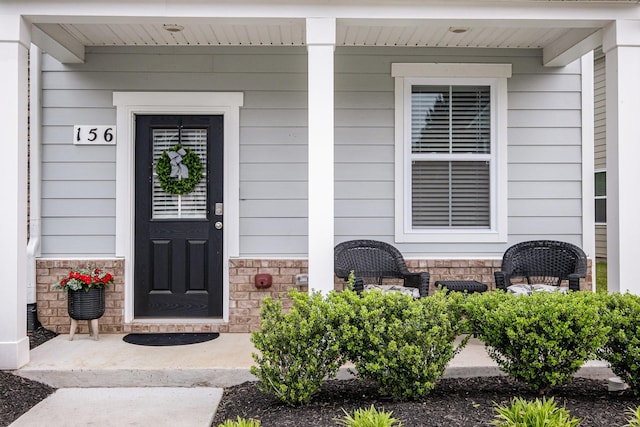 156 Cecil Rd, Lebanon, TN 37087 - view of exterior entry with a porch and stone siding