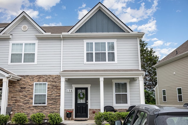 156 Cecil Rd, Lebanon, TN 37087 - view of front of house with board and batten siding, a porch, and stone siding