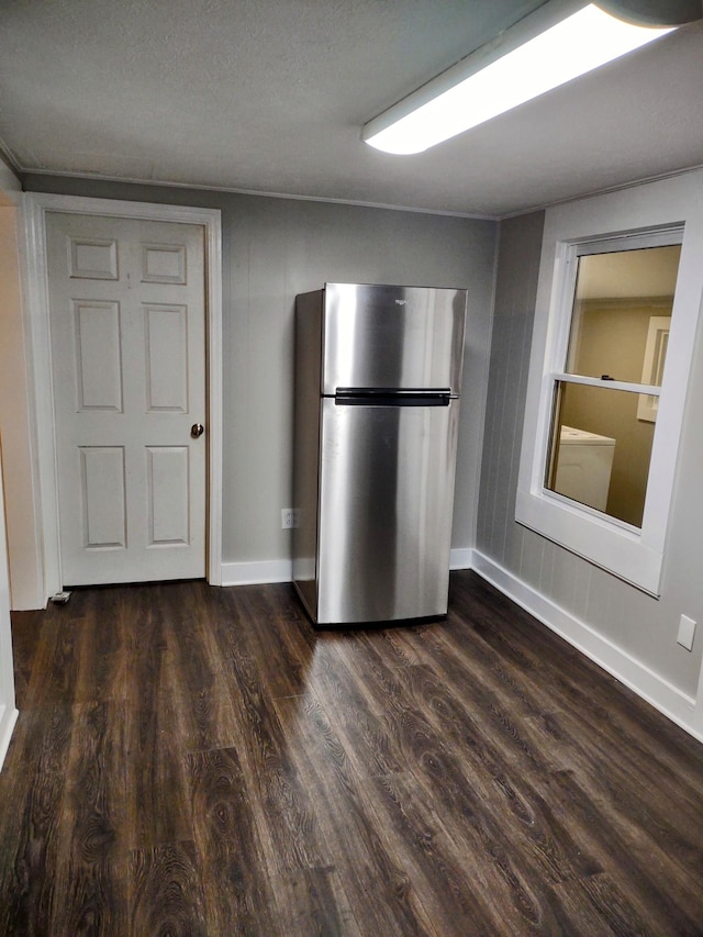 121 Swann St, Mcminnville, TN 37110 - kitchen featuring baseboards, freestanding refrigerator, and dark wood-style flooring