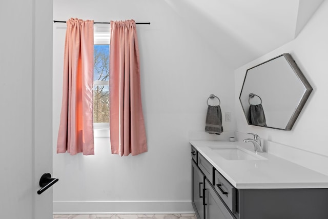 1811 Meridian St, Nashville, TN 37207 - bathroom with baseboards, lofted ceiling, and vanity