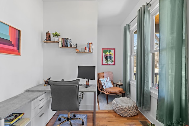 1811 Meridian St, Nashville, TN 37207 - home office with visible vents and wood finished floors
