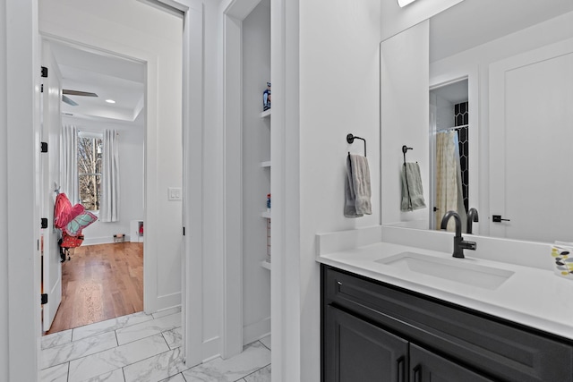 1811 Meridian St, Nashville, TN 37207 - full bathroom featuring baseboards, marble finish floor, and vanity