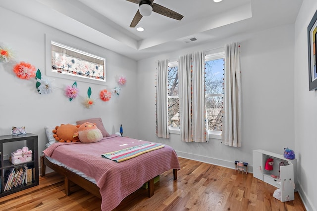 1811 Meridian St, Nashville, TN 37207 - bedroom featuring light wood-type flooring, recessed lighting, a raised ceiling, and visible vents