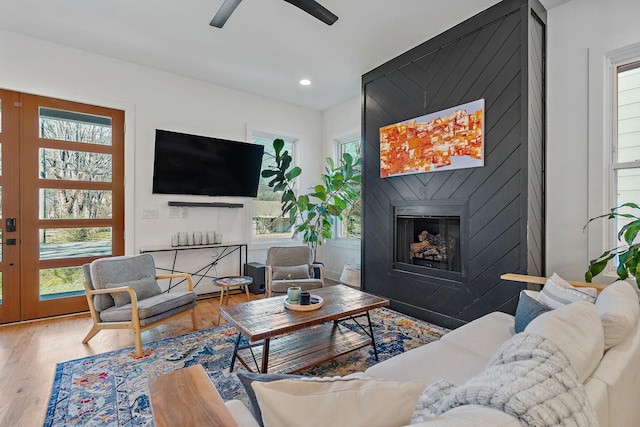 1811 Meridian St, Nashville, TN 37207 - living room featuring a large fireplace, ceiling fan, recessed lighting, and wood finished floors