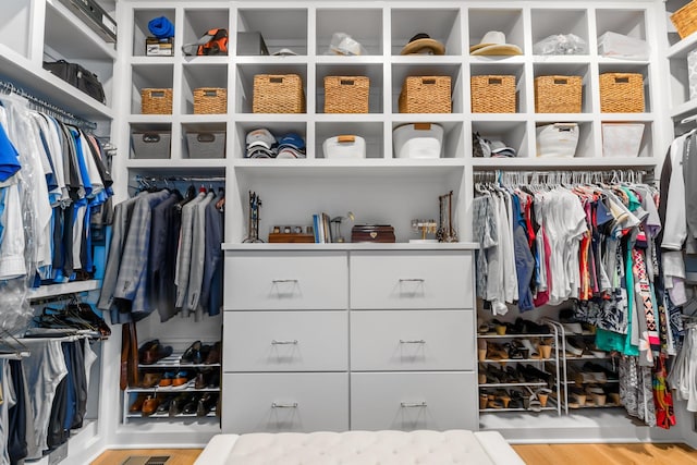 spacious closet featuring wood finished floors