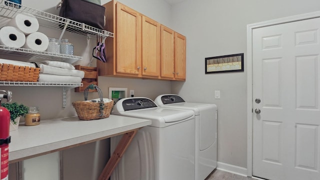 1011 Gatewick Ct, Franklin, TN 37067 - laundry room with cabinet space, washer and clothes dryer, and baseboards
