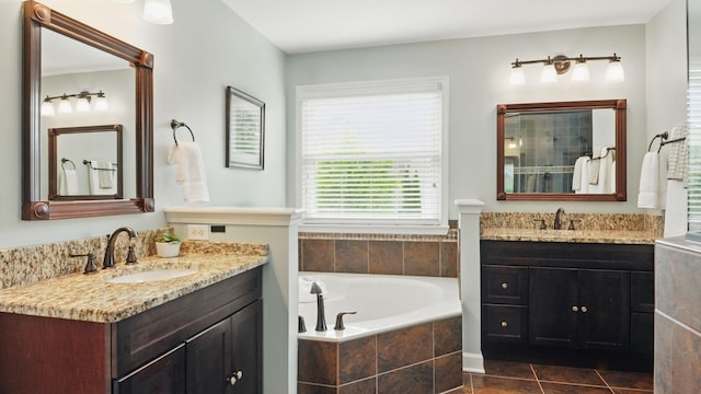 1011 Gatewick Ct, Franklin, TN 37067 - full bathroom with two vanities, a garden tub, tile patterned flooring, and tiled shower