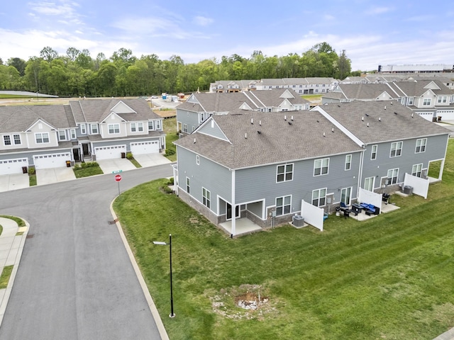 drone / aerial view with a residential view